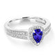 0.65ct Pear Tanzanite Ring with 0.29 cttw Diamond