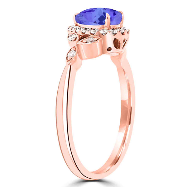 0.65ct Pear Tanzanite Ring with 0.23 cttw Diamond