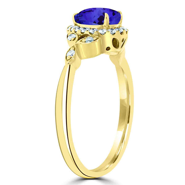 0.65ct Pear Tanzanite Ring with 0.23 cttw Diamond