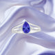 0.85ct Pear Shape Tanzanite Ring with 0.06 cttw Diamond