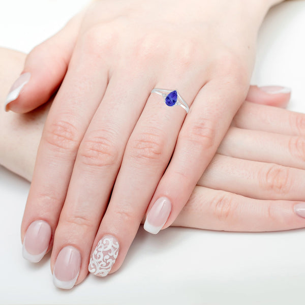 0.85ct Pear Shape Tanzanite Ring with 0.06 cttw Diamond