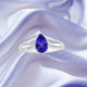 0.85ct Pear Shape Tanzanite Ring with 0.06 cttw Diamond