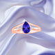0.85ct Pear Shape Tanzanite Ring with 0.06 cttw Diamond