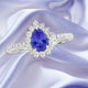 0.65ct Pear Shape Tanzanite Ring with 0.39 cttw Diamond