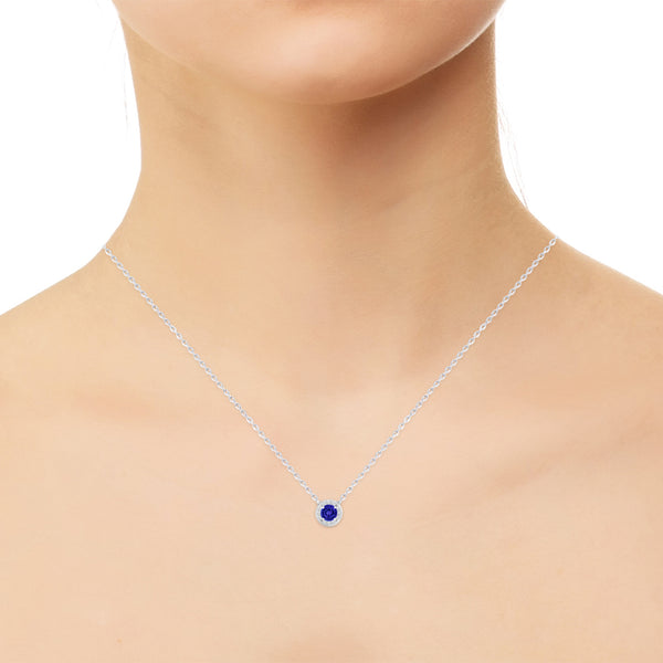 TMR121136 - Aubrey - Round Tanzanite and Diamond Pendant Halo