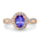 0.98ct Oval Tanzanite Ring with 0.39 cttw Diamond