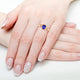 1.2ct Oval Tanzanite Ring with 0.13 cttw Diamond
