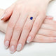 1.05ct Emerald Cut Tanzanite Ring with 0.09 cttw Diamond