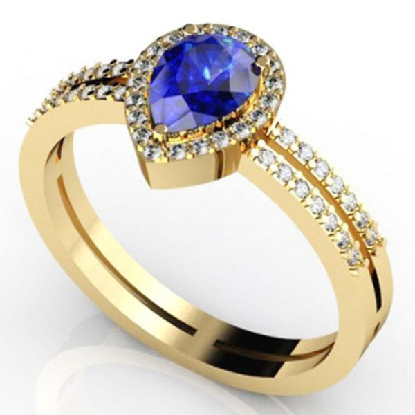 0.60ct Pear Tanzanite Ring With 0.24ctw Diamonds in 14k Gold