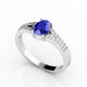 0.65ct Oval Tanzanite Ring With 0.14ctw Diamonds in 14k Gold & 18k Gold